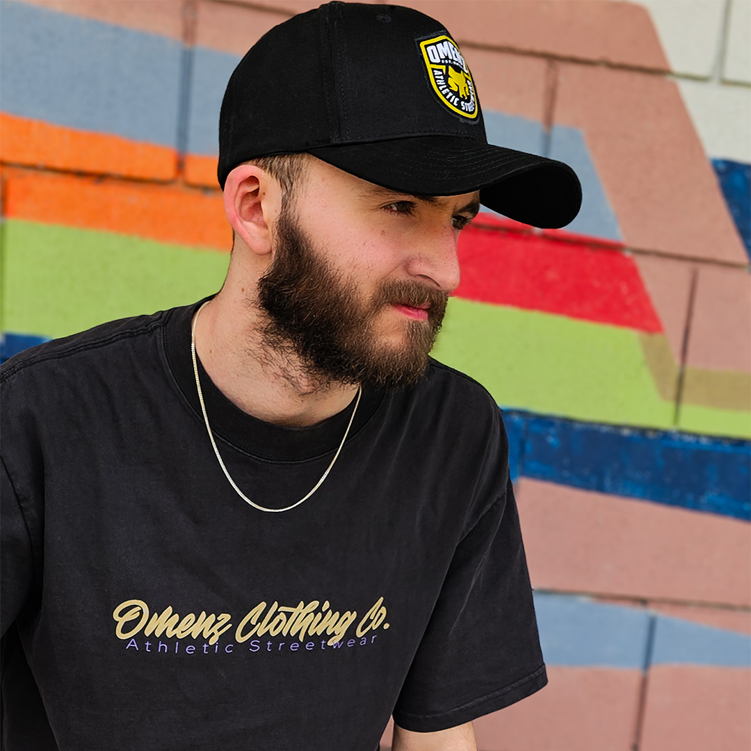 Omenz alternative graphic tees inspired by tattoo culture and skateboarding. Heavyweight cotton t-shirts with bold tattoo flash artwork, printed in Australia. 90s rock-inspired streetwear – durable, high-quality alternative apparel.