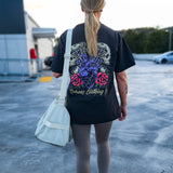 Back view of the Omenz Full Throttle oversized unisex tee. Premium 100% cotton in faded black. Athletic streetwear designs for alternative style.