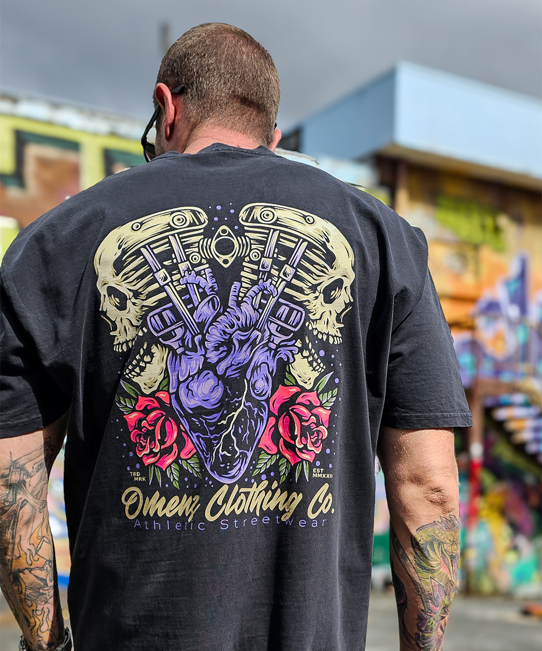 Back shot of the Omenz Clothing Co. Full Throttle oversized unisex tee. Premium 100% cotton in faded black. 