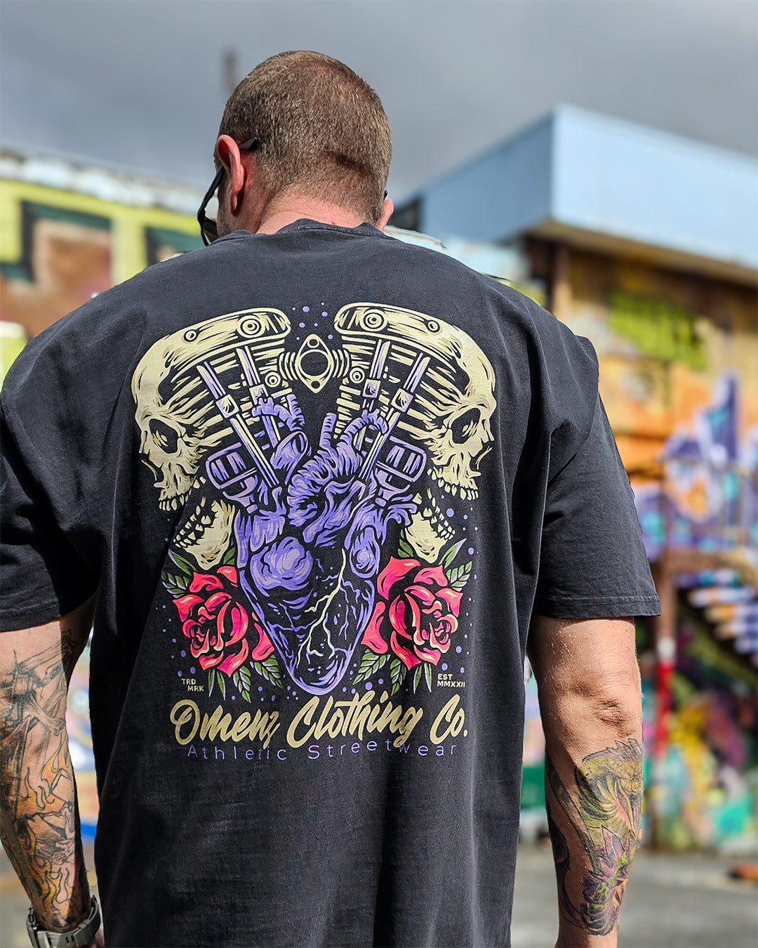 Back shot of the Omenz Clothing Co. Full Throttle oversized unisex tee. Premium 100% cotton in faded black. 