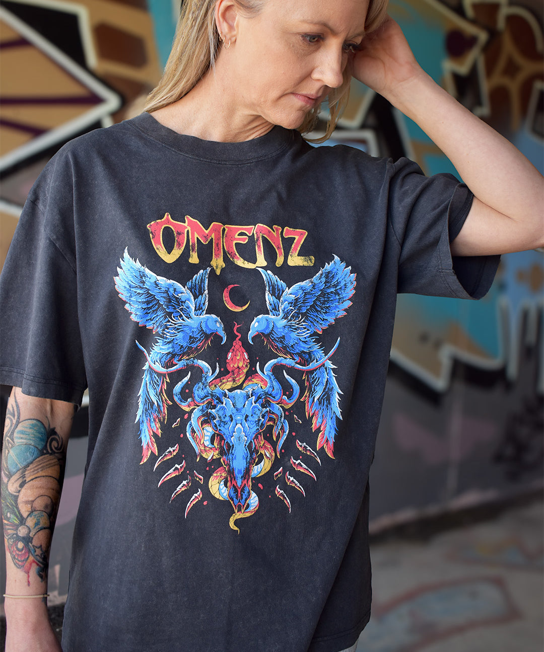 Omenz Reckoning Oversized Premium Graphic Tee Stonewash female model front view