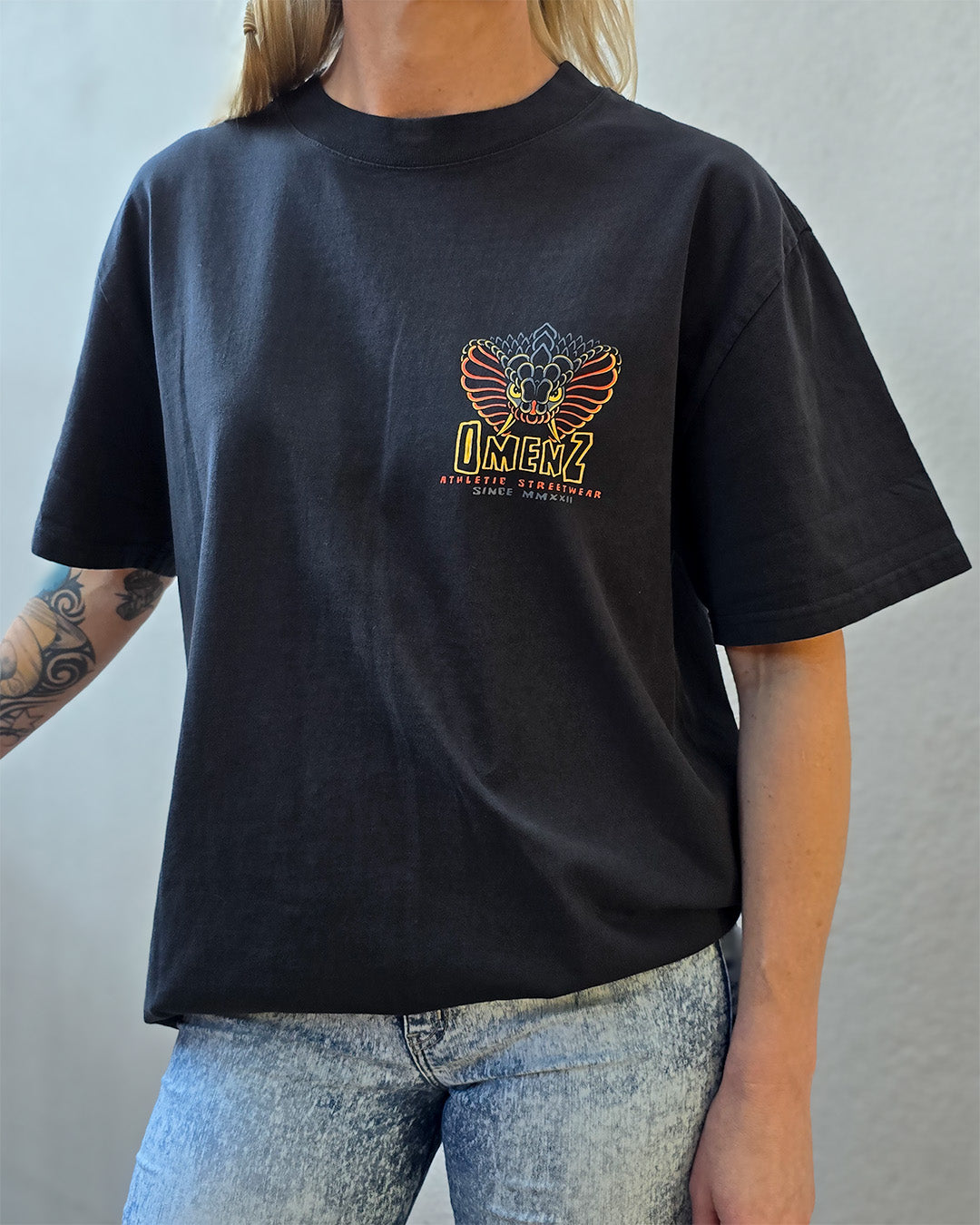 Omenz Rival Faded Black Tee front view female model