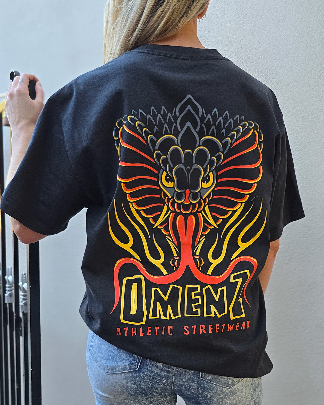 Omenz Rival Faded Black Tee Back view female model