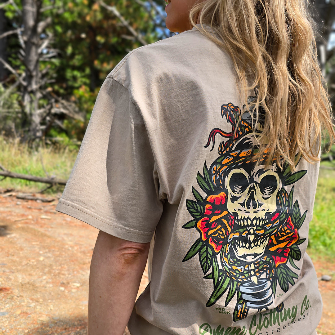 Back design of Omenz Premium Oversized Strike Hard Tee – skull and snake tattoo print on heavyweight cotton.