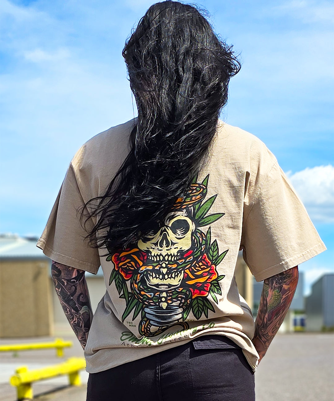 Back design of Omenz Premium Oversized Tee – skull and snake tattoo print on heavyweight cotton.