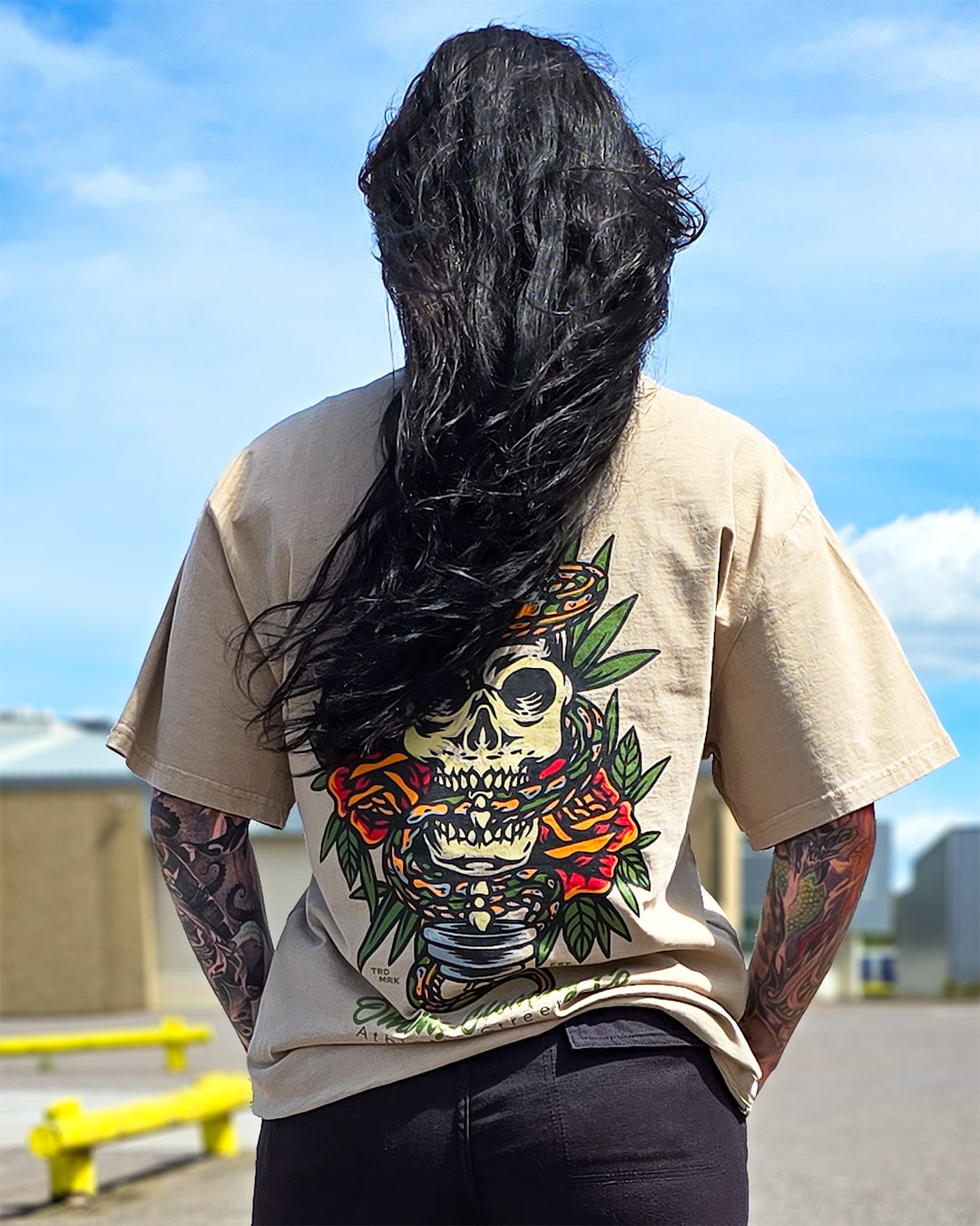 Back design of Omenz Premium Oversized Tee – skull and snake tattoo print on heavyweight cotton.