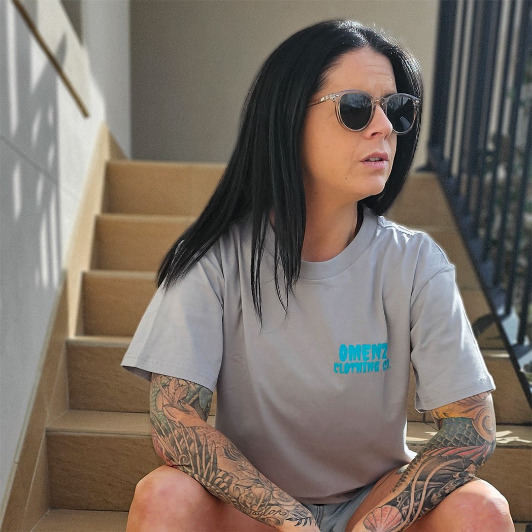 Reality | Women's Relaxed Tee Black/Storm - Omenz Clothing Co.