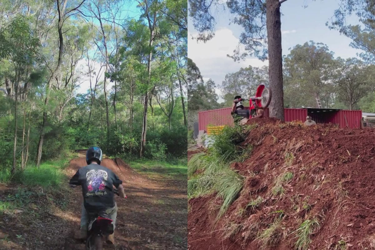 Dirt bike moto rider doing flips in a rural setting wearing Omenz Full Throttle tee